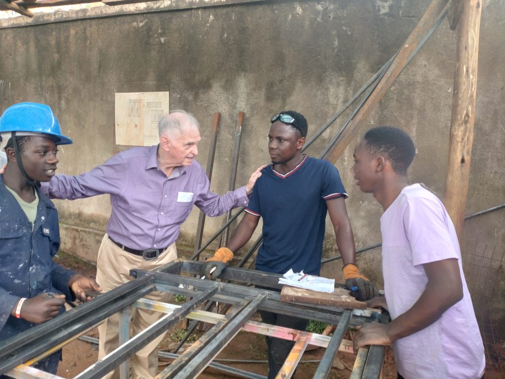 A volunteer sharing practical skills with the RMFSL team